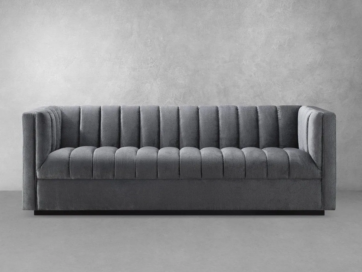 Lavish Upholstered Fabric Channel Sofa