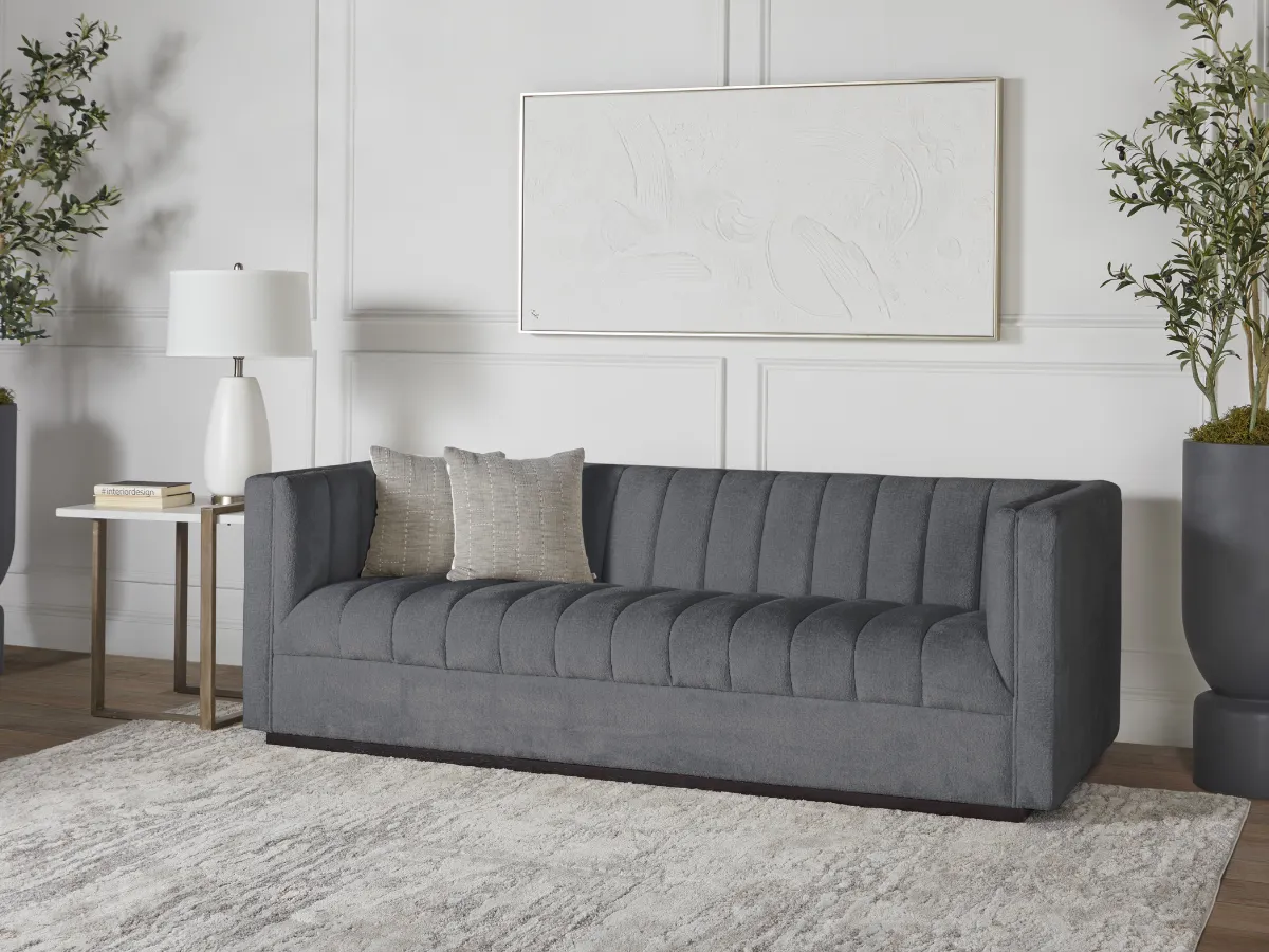 Lavish Upholstered Fabric Channel Sofa