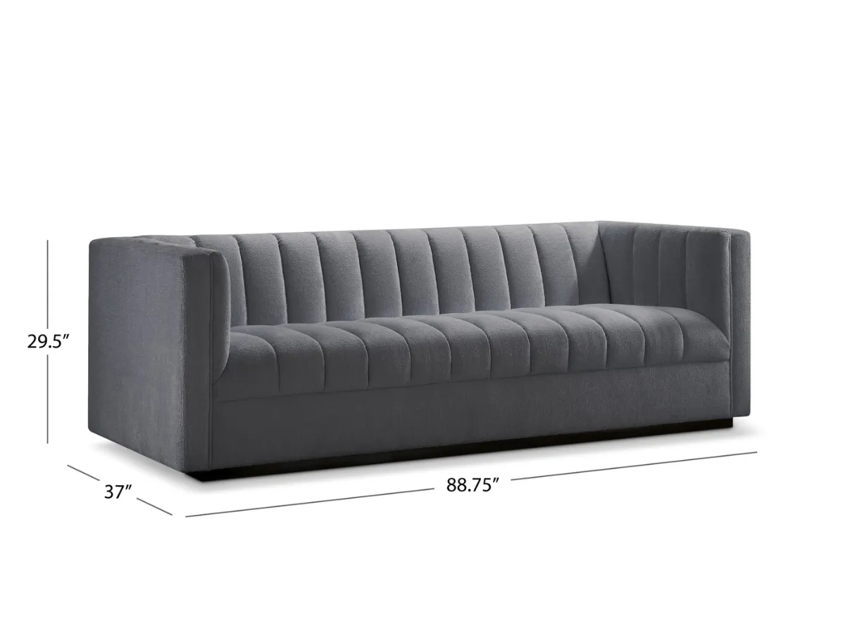 Lavish Upholstered Fabric Channel Sofa